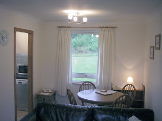 Sitting room looking towards the dining area and kitchen